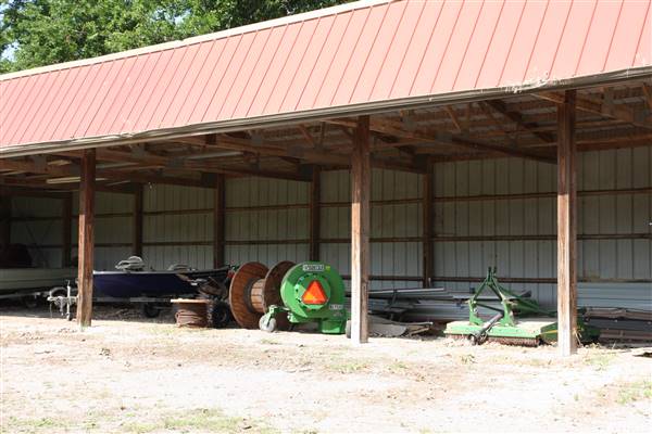 NFL Farms - Workers Houses - Down the main road of horse grazing pens is the workers housing and storage (7/2/2015 - Credits: Yousef Kazemi)