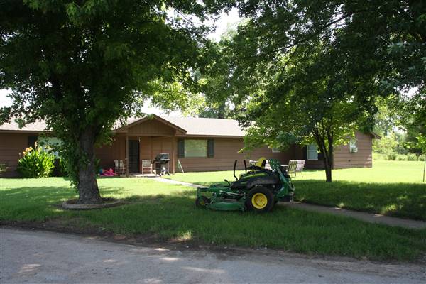 NFL Farms - Workers Houses - Down the main road of horse grazing pens is the workers housing and storage (7/2/2015 - Credits: Yousef Kazemi)