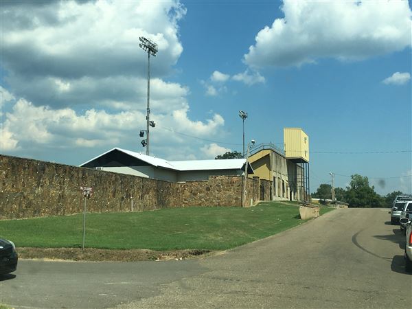 Broken Bow Memorial Stadium (Savage Stadium) - Old rock stadium surrounds old dirt style football field. (9/2/2019 - Credits: Charity O'Donnell)