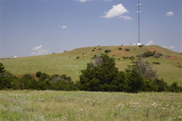 Rydell Ranch - field 2 - 2 mounds with 100' deep "red rock" canyons in between  visibility of up to 30 miles from the top of the mound Covered in mostly in eastern red cedar and some oak trees with native grasses. features slot canyons and waterfalls.  (7/28/2021 - Credits: Jeffrey Rydell)