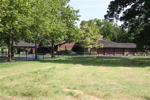 NFL Farms - The gate/entrance to the house on-site. I could not take pictures closer of the house or interiors as it is currently not available for filming. Could be ready at a later date for the right project potentially. (7/2/2015 - Credits: Yousef Kazemi)