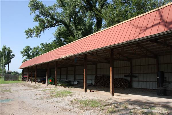 NFL Farms - Down the main road of horse grazing pens is the workers housing and storage (7/2/2015 - Credits: Yousef Kazemi)