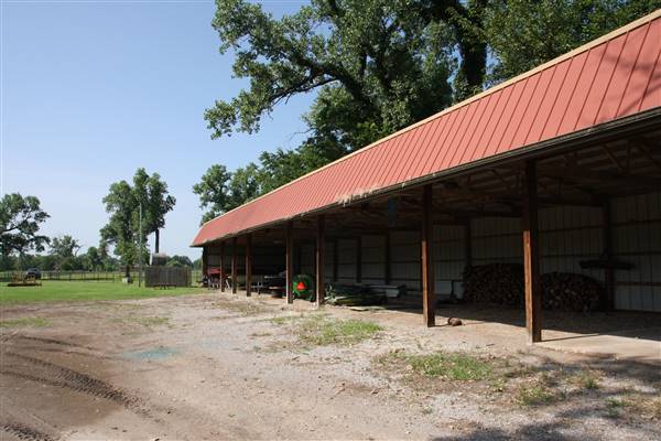 NFL Farms - Down the main road of horse grazing pens is the workers housing and storage (7/2/2015 - Credits: Yousef Kazemi)