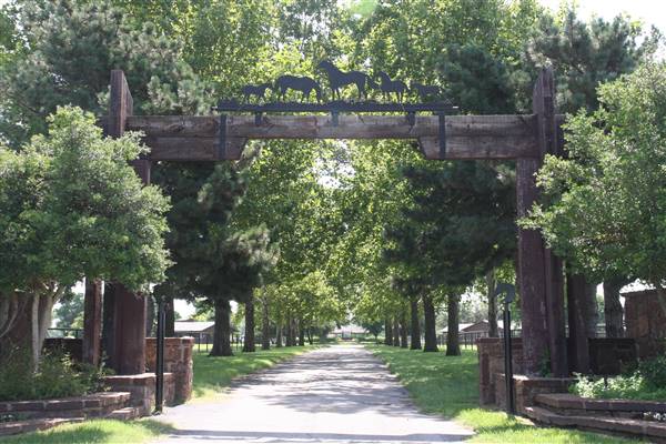 NFL Farms - Once within property, this is the drive/entrance leading to the circle which houses the business offices for the farm, a few stables, and the main hub of where the roads branch off into the property (7/2/2015 - Credits: Yousef Kazemi)