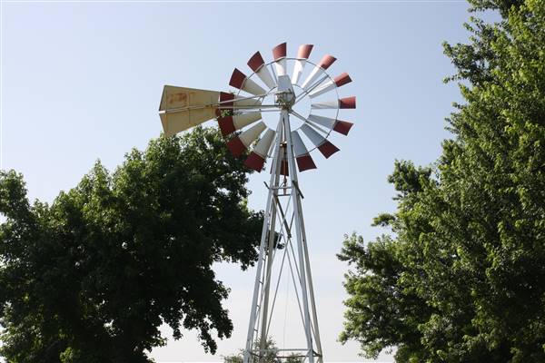 NFL Farms - The gazebo and windmill in the circle drive which houses the office and a couple barns - main vein from where roads branch off into property. (7/2/2015 - Credits: Yousef Kazemi)
