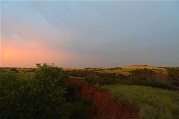 Rydell Ranch - field 2 - 2 mounds with 100' deep "red rock" canyons in between  visibility of up to 30 miles from the top of the mound Covered in mostly in eastern red cedar and some oak trees with native grasses. features slot canyons and waterfalls.  (7/28/2021 - Credits: Jeffrey Rydell)