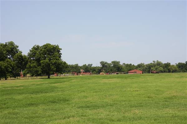 NFL Farms - Another huge area of stables located west of the offices/houses/main pens across the old polo field, but I wasn't able to photograph as there were unsecured watch dogs. Can photograph at a later date. (7/2/2015 - Credits: Yousef Kazemi)