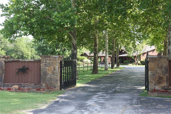 NFL Farms - The gate/entrance to the house on-site. I could not take pictures closer of the house or interiors as it is currently not available for filming. Could be ready at a later date for the right project potentially. (7/2/2015 - Credits: Yousef Kazemi)
