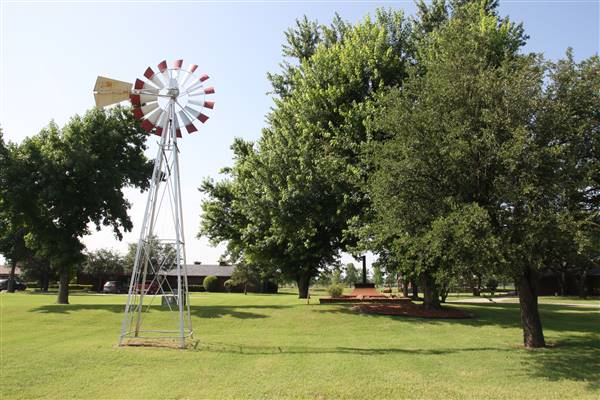 NFL Farms - The gazebo and windmill in the circle drive which houses the office and a couple barns - main vein from where roads branch off into property. (7/2/2015 - Credits: Yousef Kazemi)