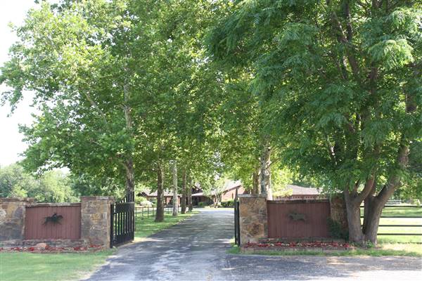 NFL Farms - The gate/entrance to the house on-site. I could not take pictures closer of the house or interiors as it is currently not available for filming. Could be ready at a later date for the right project potentially. (7/2/2015 - Credits: Yousef Kazemi)
