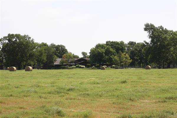 NFL Farms - Front view of the house from the other road. I could not take pictures closer of the house or interiors as it is currently not available for filming. Could be ready at a later date for the right project potentially. (7/2/2015 - Credits: Yousef Kazemi)