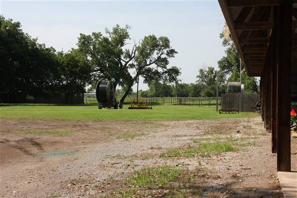 NFL Farms - Workers Houses - Down the main road of horse grazing pens is the workers housing and storage (7/2/2015 - Credits: Yousef Kazemi)